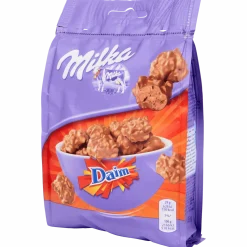 Snax Daim < Milka New